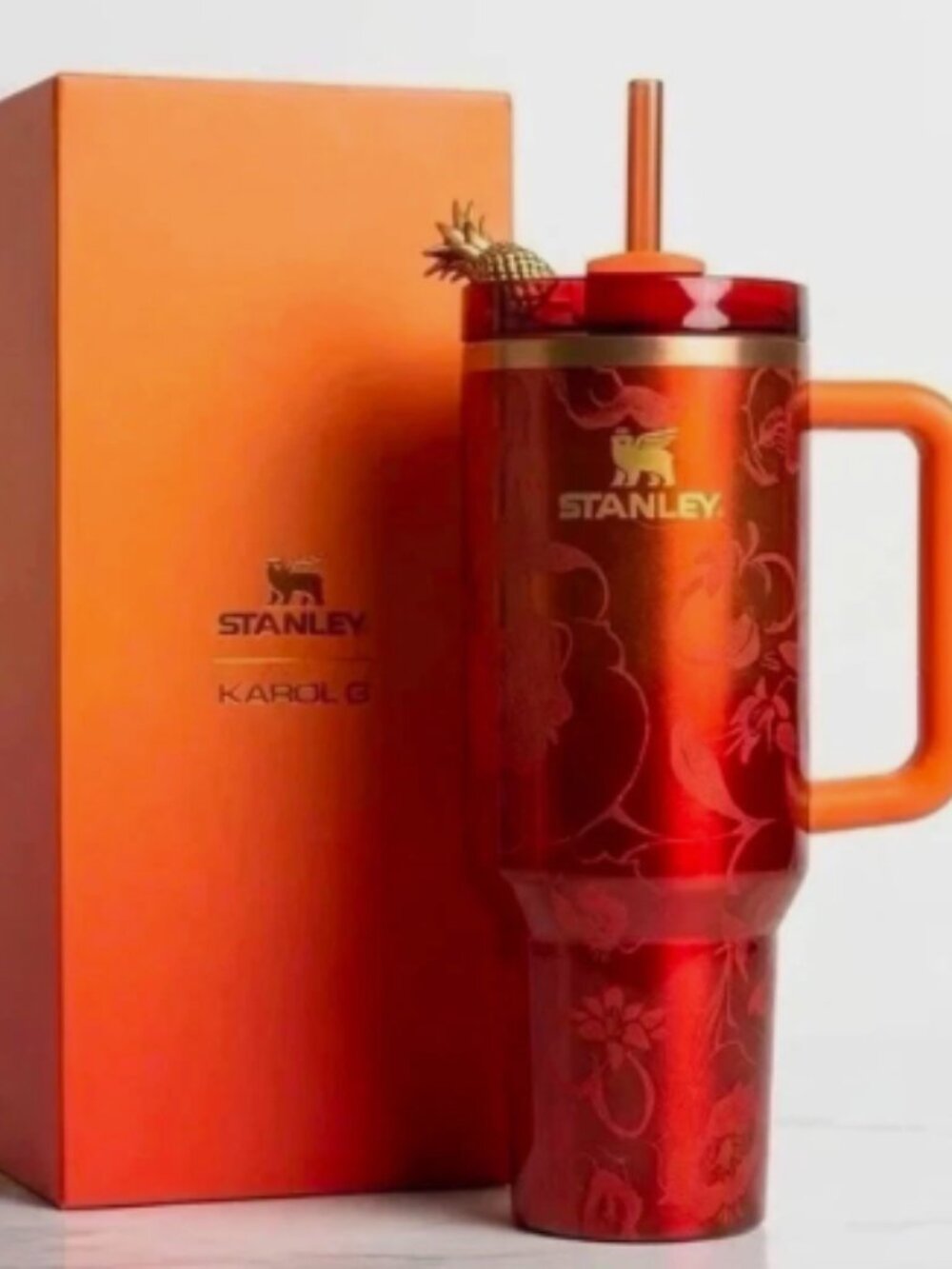 The Stanley 1913 x KAROL G 40 oz Quencher H2.O FlowState Tumbler